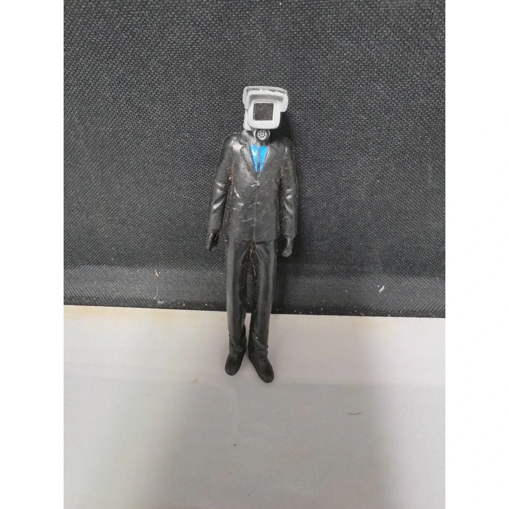 Skibidi Toilet TV Man Figure White Head Black Suit Blue Shirt